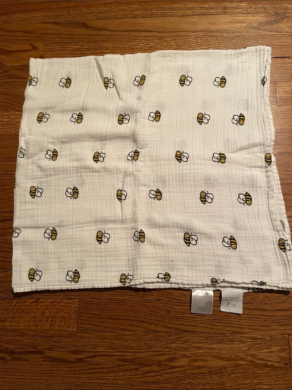 aden + anais White Muslin Swaddle with Yellow and Black Bee Print